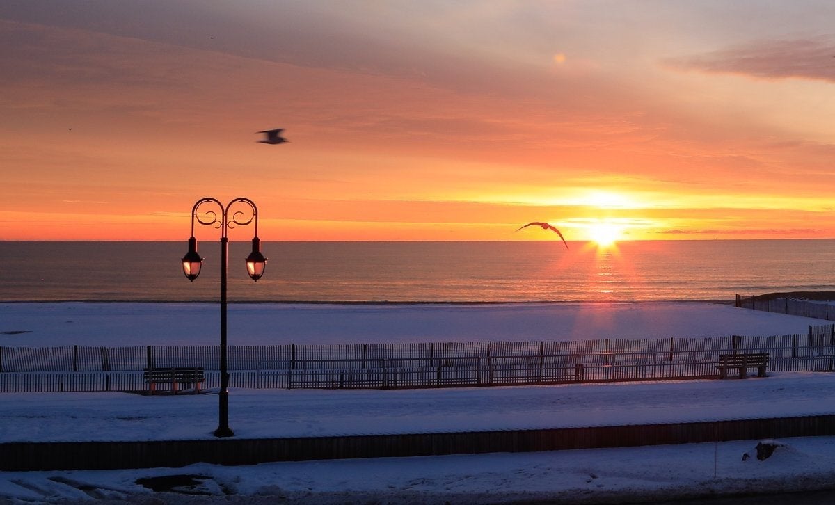Brilliant Sunrise this morning at the snow covered beach