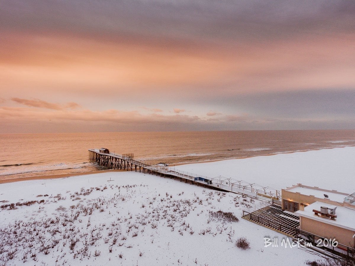 Snowy morning at the beach in Jersey photos